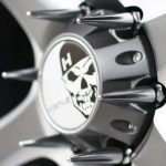 Alloy wheel with spike lug nuts installed