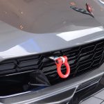 Chevy corvette with a red tow hook